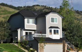 Why Do So Many Roofing Contractors in Brighton Suggest Using Asphalt Shingles?