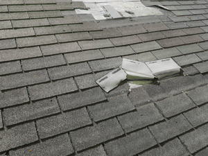 Armour Roofing and Exteriors repairing a damaged roof in Thornton, Colorado