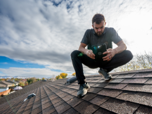 Secure Halloween decorations on a roof, inspected by a Brighton roofing contractor.
