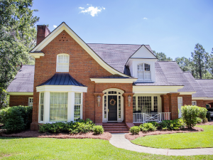 Illustration of a secure, well-maintained roof in Westminster, CO, with a clear sky in the background.