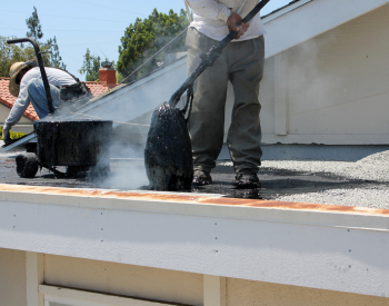 Reflective coatings on a flat Lakewood roof